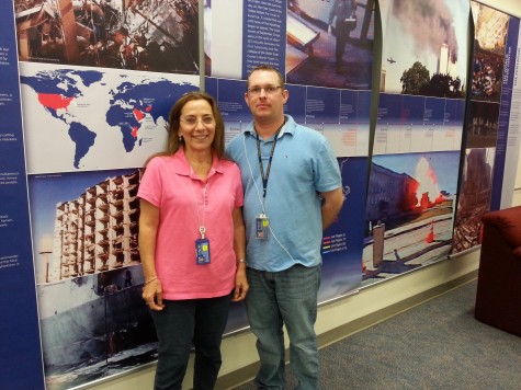 Librarians Rose Gillen and Daniel Sabol put together the 9/11 exhibit Mortola Library Remembers. Behind them is the massive timeline that runs along near the library’s back wall. The timeline offers a visually detailed representation of the events that occurred on the tragic day.