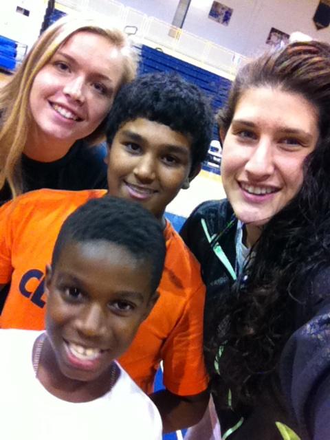 Pictured are Mark Browns two sons with Margo Hackett and Yuni Sher,  two members of the womens basketball team at Pace. 