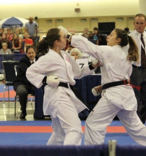 Junior Marisa Ruland (right), best known at Pace for her time on the soccer team, discusses her other love: Isshin-ryu karate.  Photo Courtesy of Marisa Ruland.