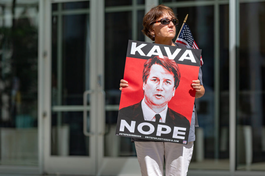 A protester against the confirmation of U.S. Supreme Court nominee Brett Kavanaugh outside the Warren E. Burger Federal Building in St. Paul, Minnesota.