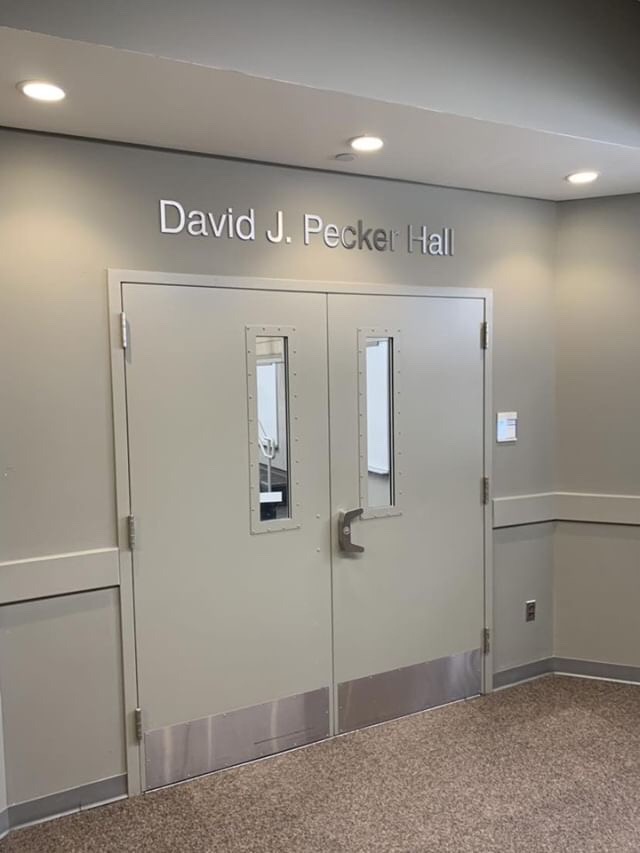 The lecture hall named after David Pecker is located on the 1st floor of Wilcox. 