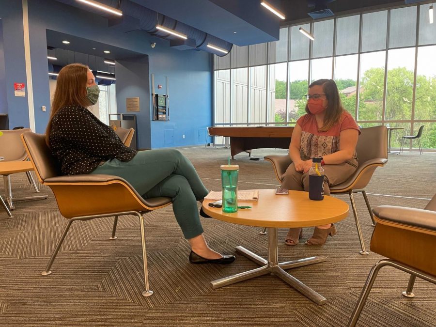 Kayla Betacchini, Assistant Director for Orientation and Transitions in SDCA, and Caitlin Galvin, a master’s student at the University of Maine who is living on campus while doing a summer internship in the area, chat at the Kessel Student Center, June 22, 2021. Kessel is already showing signs of loosening restrictions, such as uncovering the pool table.