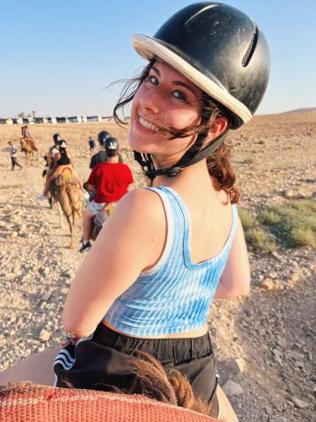 A photo from Abigail Orkin riding a camel 
