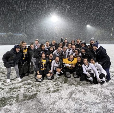 Pace Field Hockey pose for a picture after their upset win on snowy Brian Kelly 83 Stadium