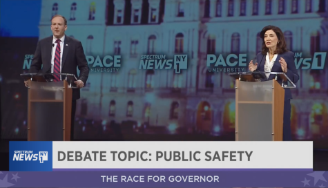 Candidates Representative Lee Zeplin (R) and Governor Kathy Hochul (D) debate about New Yorks public safety on live stream at Pace Universitys Schimmel Theatre Tuesday, October 25th. (Photo Credit: Spectrum News One NY)   