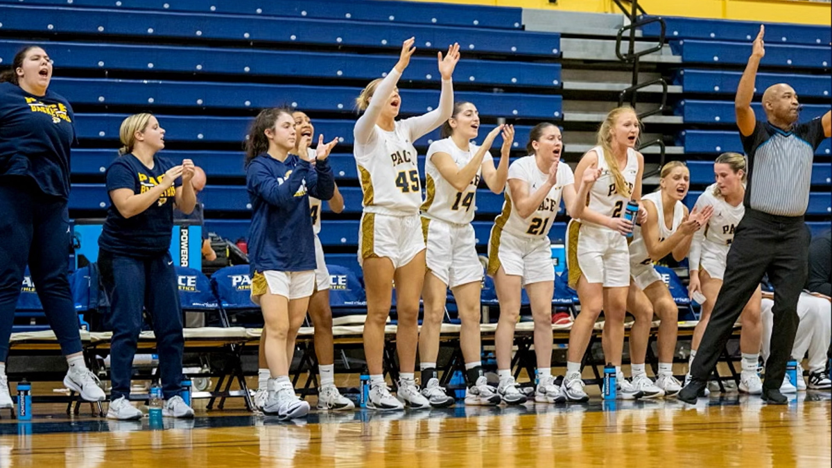 The Pace Women's basketball bench celebrates on the sidelines (Paceuathletics.com)