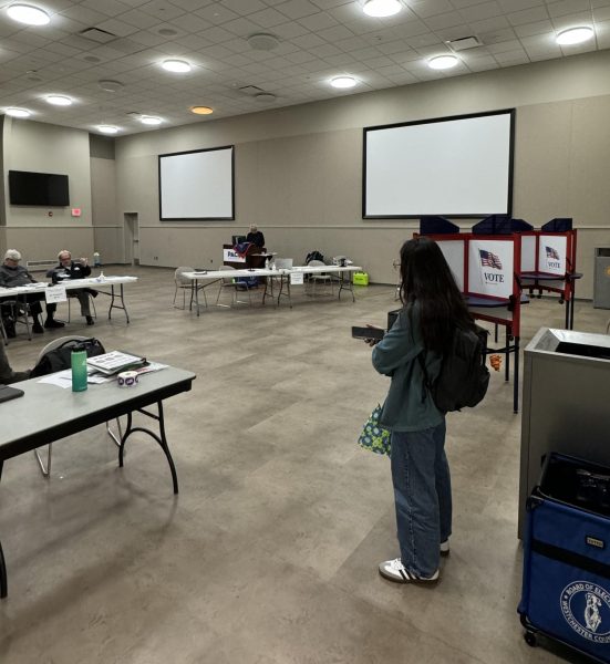 CCAR Office Coordinator Christina Burchett standing in Wilcox MPR, one of two designated polling locations for Pace students, on April 2, 2024. 